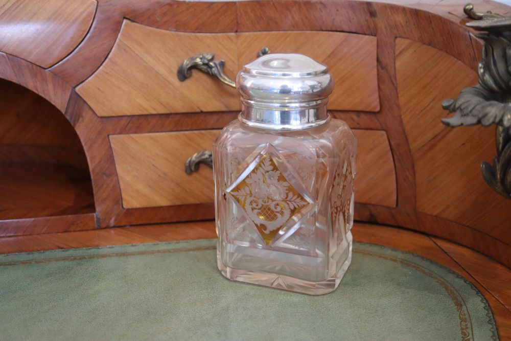 A George V silver lidded amber flash cut glass scent jar, makers mark rubbed, London, 1931, 16.5cm.